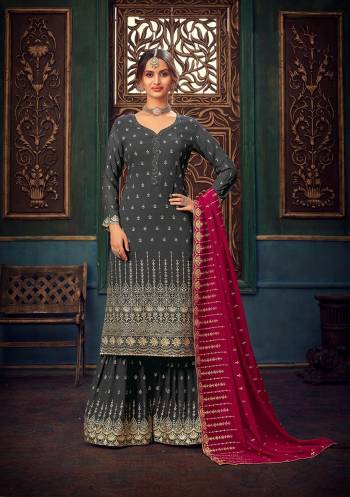 Attrective Look This Designer Long Length Suit In Lovely Color.Its Pretty Heavy Designer Embroidery,Swarovski Metal Hand Work Top Is Georgette Based Paired With Santoon Bottom And Georgette Fabricated Dupatta Which Gives An Attractive To The Suit.