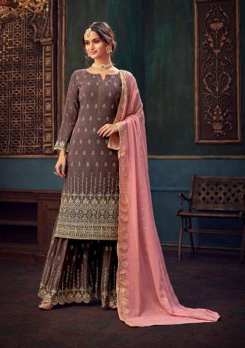 Attrective Look This Designer Long Length Suit In Lovely Color.Its Pretty Heavy Designer Embroidery,Swarovski Metal Hand Work Top Is Georgette Based Paired With Santoon Bottom And Georgette Fabricated Dupatta Which Gives An Attractive To The Suit.