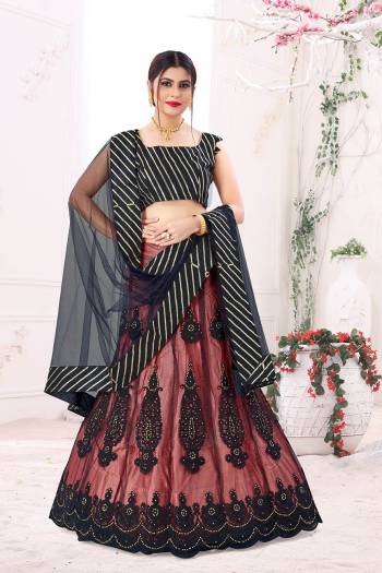 Garb This Partywear Heavy Designer Lehenga Choli And Dupatta In Fine Color Fabricated On Blouse Banglori Silk And Lahenga And Dupatta Are Mono Net Beautified With Heavy Attractive Work. 