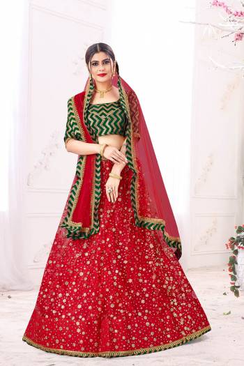 Garb This Partywear Heavy Designer Lehenga Choli And Dupatta In Fine Color Fabricated On Blouse Jacquard Silk And Lahenga And Dupatta Are Mono Net Beautified With Heavy Attractive Work. 