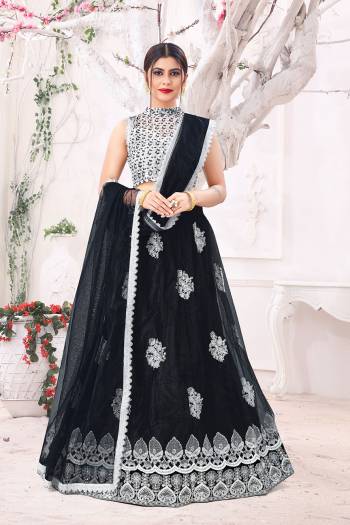 Garb This Partywear Heavy Designer Lehenga Choli And Dupatta In Fine Color Fabricated On Blouse Mono Net And Lahenga And Dupatta Are Mono Net Beautified With Heavy Attractive Work. 