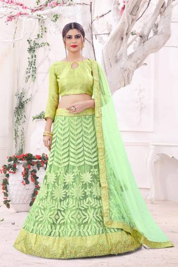 Garb This Partywear Heavy Designer Lehenga Choli And Dupatta In Fine Color Fabricated On Blouse Jacquard And Lahenga And Dupatta Are Mono Net Beautified With Heavy Attractive Work. 