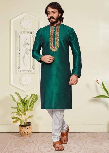 Take your ethnic style quotient to the next level by wearing this fashionable. Tailored Kurta Pajama  finest Art Silk fabric With Embroidery Work and fashioned with a banded collar for a dash of style.