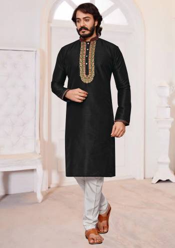 Take your ethnic style quotient to the next level by wearing this fashionable. Tailored Kurta Pajama  finest Art Silk fabric With Embroidery Work and fashioned with a banded collar for a dash of style.