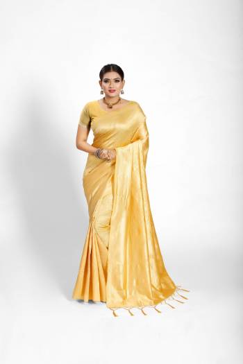 Garb This Partywear Saree Are Fine Saree Paired With Blouse.This Saree And Blouse Are Tanchoi Silk Based Fabric With Heavy Jacquard Designer Work. Buy This Pretty Saree Now.