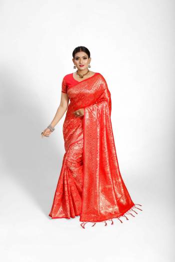 Garb This Partywear Saree Are Fine Saree Paired With Blouse.This Saree And Blouse Are Tanchoi Silk Based Fabric With Heavy Jacquard Designer Work. Buy This Pretty Saree Now.