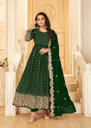 Garb This Designer Long Length Suit In Lovely Color.Its Pretty Heavy Designer Foil Mirror Embroidery Work Top Is Georgette Based Paired With Santoon Bottom And Georgette Fabricated Dupatta Which Gives An Attractive To The Suit.