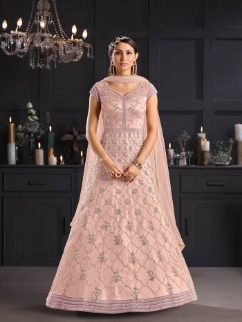 Attrective This Partywear Designer Long Suits In Lovely Fine Color.?Its Pretty Designer Thread Embroidery Work Top Is Butterfly Net Based Paired Bottom Satin With Batterfly Net Fabricated Dupatta Which Gives An Attractive To The Dress.