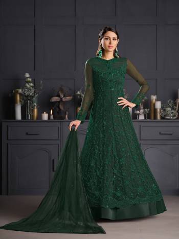 Attrective This Partywear Designer Long Suits In Lovely Fine Color.?Its Pretty Designer Thread Embroidery Work Top Is Butterfly Net Based Paired Bottom Satin With Batterfly Net Fabricated Dupatta Which Gives An Attractive To The Dress.