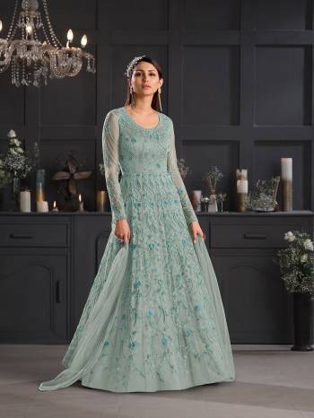 Attrective This Partywear Designer Long Suits In Lovely Fine Color.?Its Pretty Designer Thread Embroidery Work Top Is Butterfly Net Based Paired Bottom Satin With Batterfly Net Fabricated Dupatta Which Gives An Attractive To The Dress.