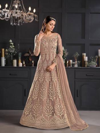 Attrective This Partywear Designer Long Suits In Lovely Fine Color.?Its Pretty Designer Thread Embroidery Work Top Is Butterfly Net Based Paired Bottom Satin With Batterfly Net Fabricated Dupatta Which Gives An Attractive To The Dress.