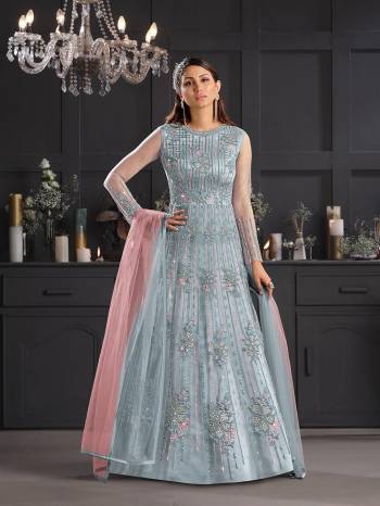 Attrective This Partywear Designer Long Suits In Lovely Fine Color.?Its Pretty Designer Thread Embroidery Work Top Is Butterfly Net Based Paired Bottom Satin With Batterfly Net Fabricated Dupatta Which Gives An Attractive To The Dress.