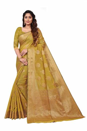 Garb This Stylist Saree Are Fine Saree Paired With Blouse.This Saree And Blouse Are Banarasi Cotton Fabric With Designer Wevon Jacquard. Buy This Pretty Saree Now.