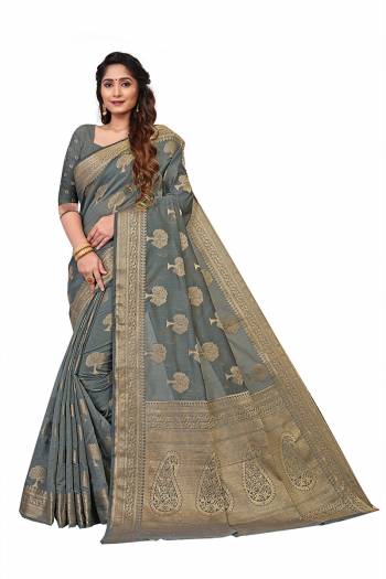 Garb This Stylist Saree Are Fine Saree Paired With Blouse.This Saree And Blouse Are Banarasi Cotton Fabric With Designer Wevon Jacquard. Buy This Pretty Saree Now.