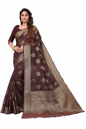 Garb This Stylist Saree Are Fine Saree Paired With Blouse.This Saree And Blouse Are Banarasi Cotton Fabric With Designer Wevon Jacquard. Buy This Pretty Saree Now.