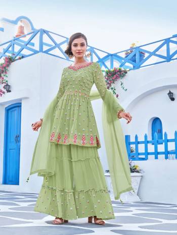 Grab This Readymade Sharara Plazzo Suits In Fine Color Fabricated On Georgette And Dupatta Are Net Beautified With Embroidery Work. It Is Light In Weight And Easy To Carry All Day Long. 