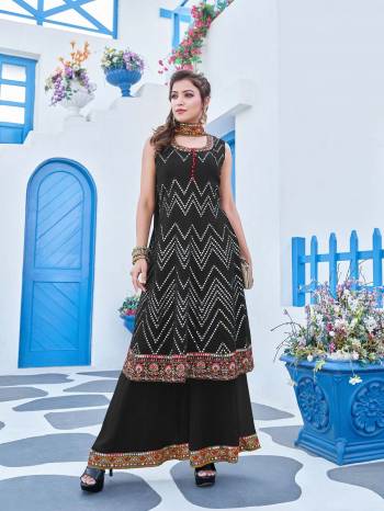 Grab This Readymade Sharara Plazzo Suits In Fine Color Fabricated On Georgette And Dupatta Are Net Beautified With Embroidery Work. It Is Light In Weight And Easy To Carry All Day Long. 