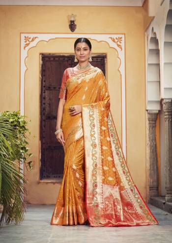 Looking This Traditional Partywear Saree Are Fine Saree Paired With Contrasted Blouse.This Saree And Blouse Are Banarasi Silk Based Fabric With Designer Weaving Work. Buy This Pretty Saree Now.