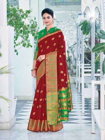 Looking This Traditional Saree Are Fine Saree Paired With Contrasted Blouse.This Saree And Blouse Are Cotton Based Fabric With Heavy Wevon Designer Work. Buy This Pretty Saree Now.