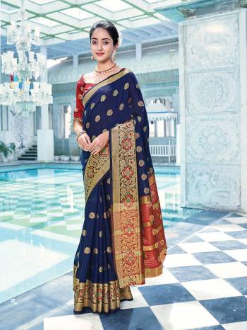 Looking This Traditional Saree Are Fine Saree Paired With Contrasted Blouse.This Saree And Blouse Are Cotton Based Fabric With Heavy Wevon Designer Work. Buy This Pretty Saree Now.