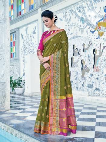 Looking This Traditional Saree Are Fine Saree Paired With Contrasted Blouse.This Saree And Blouse Are Cotton Based Fabric With Heavy Wevon Designer Work. Buy This Pretty Saree Now.