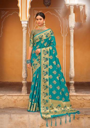 Attrective This Traditional Saree Are Fine Saree Paired With Blouse.This Saree And Blouse Are Organza Based Fabric With Heavy Wevon Designer Rich Pallu Work. Buy This Pretty Saree Now.