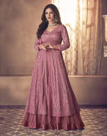 Attrective Look This Designer Long Length Readymade Suit In Lovely Color.Its Pretty Heavy Designer Embroidery Work Top Is Georgette Based Paired With Dull Santoon Bottom And Nazmeen Fabricated Dupatta Which Gives An Attractive To The Suit.