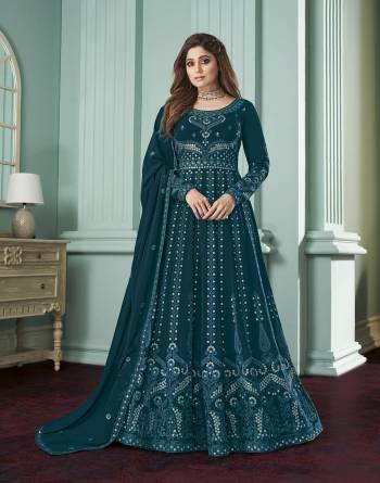 Garb This Designer Long Length Suit In Lovely Color.Its Pretty Heavy Designer Multy,Sequance Embroidery Work Top Is Georgette Based Paired With Santoon Bottom And Georgette Fabricated Dupatta Which Gives An Attractive To The Suit.