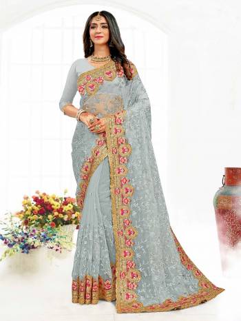 Looking This Partywear Saree Are Fine Saree Paired With Blouse.This Saree And Blouse Are Net Fabric With Heavy Designer Embroidery And Siramic Stone Work. Buy This Pretty Saree Now.