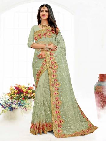 Looking This Partywear Saree Are Fine Saree Paired With Blouse.This Saree And Blouse Are Net Fabric With Heavy Designer Embroidery And Siramic Stone Work. Buy This Pretty Saree Now.