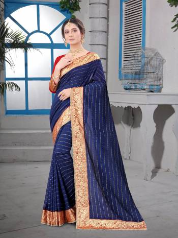 Attrective Look This Fastival Partywear Saree Are Fine Saree Paired With Blouse.This Saree Are Vichitra Silk And Blouse Are Mono Banglori Silk Based Fabric With Heavy Dew Drope With Moti And Banarasi Border. Buy This Pretty Saree Now.