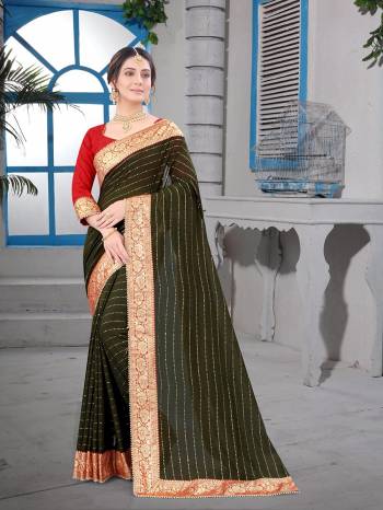 Attrective Look This Fastival Partywear Saree Are Fine Saree Paired With Blouse.This Saree Are Vichitra Silk And Blouse Are Mono Banglori Silk Based Fabric With Heavy Dew Drope With Moti And Banarasi Border. Buy This Pretty Saree Now.