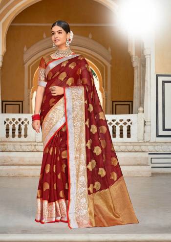 Garb This Traditional Saree Are Fine Saree Paired With Blouse.This Saree And Blouse Are Organza Based Fabric With Heavy Wevon Rich Pallu Work. Buy This Pretty Saree Now.