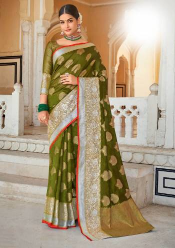 Garb This Traditional Saree Are Fine Saree Paired With Blouse.This Saree And Blouse Are Organza Based Fabric With Heavy Wevon Rich Pallu Work. Buy This Pretty Saree Now.