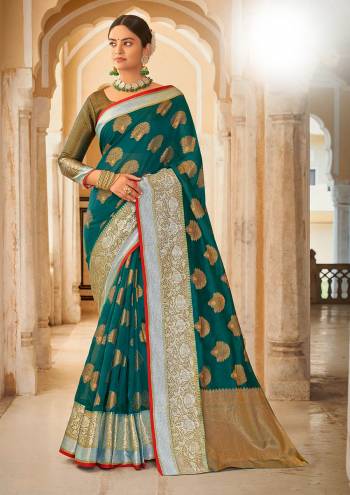 Garb This Traditional Saree Are Fine Saree Paired With Blouse.This Saree And Blouse Are Organza Based Fabric With Heavy Wevon Rich Pallu Work. Buy This Pretty Saree Now.