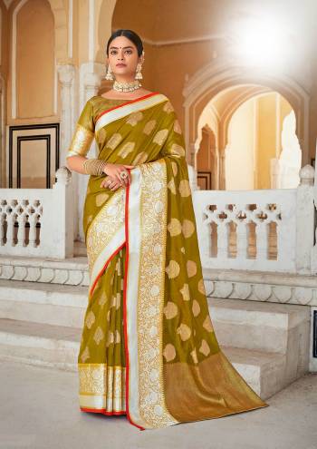 Garb This Traditional Saree Are Fine Saree Paired With Blouse.This Saree And Blouse Are Organza Based Fabric With Heavy Wevon Rich Pallu Work. Buy This Pretty Saree Now.