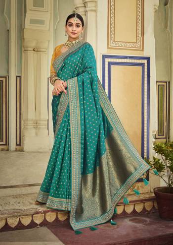 Attrective Looking This Traditional Partywear Saree Are Fine Saree Paired With Contrasted Blouse.This Saree And Blouse Are Banarasi Silk Fabric With Heavy Weaving Designer And Blouse Are Embroidery Work. Buy This Pretty Saree Now.