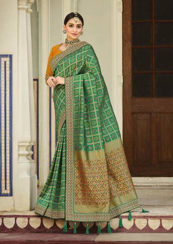 Attrective Looking This Traditional Partywear Saree Are Fine Saree Paired With Contrasted Blouse.This Saree And Blouse Are Banarasi Silk Fabric With Heavy Weaving Designer And Blouse Are Embroidery Work. Buy This Pretty Saree Now.