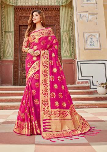 Looking This Traditional Tassle Saree Are Fine Saree Paired With Blouse.This Saree And Blouse Are Organza Based Fabric With Heavy Wevon Designer Work. Buy This Pretty Saree Now.