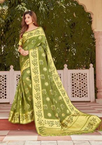 Looking This Traditional Tassle Saree Are Fine Saree Paired With Blouse.This Saree And Blouse Are Organza Based Fabric With Heavy Wevon Designer Work. Buy This Pretty Saree Now.