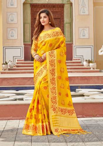 Looking This Traditional Tassle Saree Are Fine Saree Paired With Blouse.This Saree And Blouse Are Organza Based Fabric With Heavy Wevon Designer Work. Buy This Pretty Saree Now.