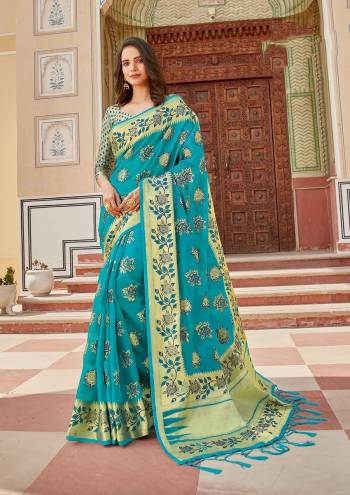 Looking This Traditional Tassle Saree Are Fine Saree Paired With Blouse.This Saree And Blouse Are Organza Based Fabric With Heavy Wevon Designer Work. Buy This Pretty Saree Now.