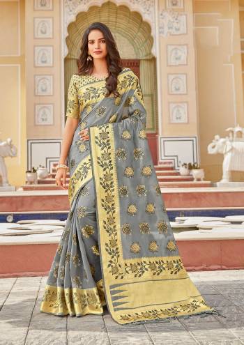 Looking This Traditional Tassle Saree Are Fine Saree Paired With Blouse.This Saree And Blouse Are Organza Based Fabric With Heavy Wevon Designer Work. Buy This Pretty Saree Now.