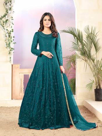 Looking This Designer Long Length Suit In Lovely Color.Its Pretty Heavy Designer Thread Sequance Embroidery Work Top Is Net Based Paired With Santoon Bottom And Net Fabricated Dupatta Which Gives An Attractive To The Suit.