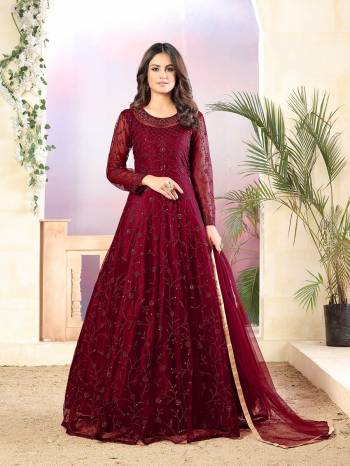 Looking This Designer Long Length Suit In Lovely Color.Its Pretty Heavy Designer Thread Sequance Embroidery Work Top Is Net Based Paired With Santoon Bottom And Net Fabricated Dupatta Which Gives An Attractive To The Suit.