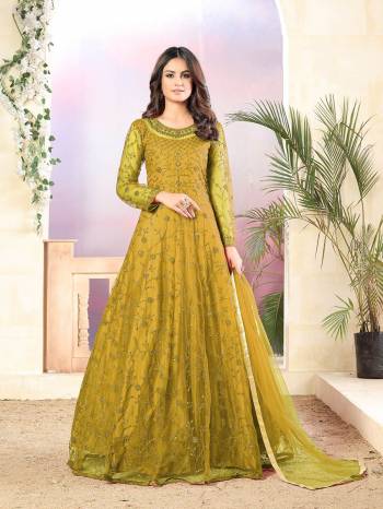 Looking This Designer Long Length Suit In Lovely Color.Its Pretty Heavy Designer Thread Sequance Embroidery Work Top Is Net Based Paired With Santoon Bottom And Net Fabricated Dupatta Which Gives An Attractive To The Suit.