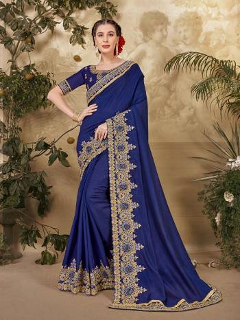 Grab This Pretty Elegant Looking Designer Saree In Fine Color Paired With Blouse. This Saree And Blouse Are Vichitra Silk Based Beautified With Embroidery Peaich And Blouse Work. Buy Now.