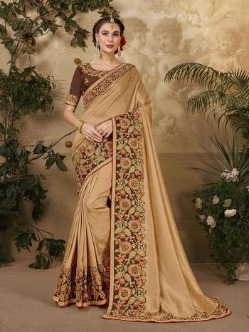 Grab This Pretty Elegant Looking Designer Saree In Fine Color Paired With Blouse. This Saree And Blouse Are Vichitra Silk Based Beautified With Embroidery Peaich And Blouse Work. Buy Now.