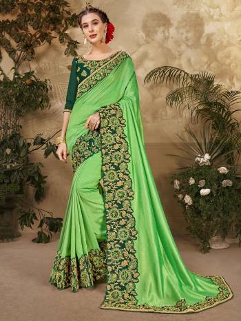 Grab This Pretty Elegant Looking Designer Saree In Fine Color Paired With Blouse. This Saree And Blouse Are Vichitra Silk Based Beautified With Embroidery Peaich And Blouse Work. Buy Now.