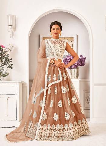 Garb This Partywear Heavy Designer Lehenga Choli And Dupatta In Fine Color Fabricated On Blouse Mono Net And Lahenga And Dupatta Are Mono Net Beautified With Heavy Attractive Work. 